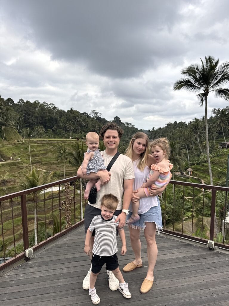The Sommer family on a wooden walkway surrounded by jungle in Bali.